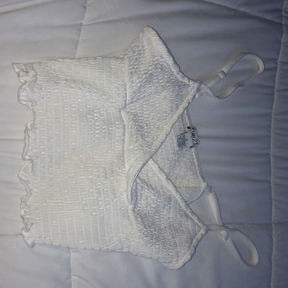 White, spaghetti, crop top.